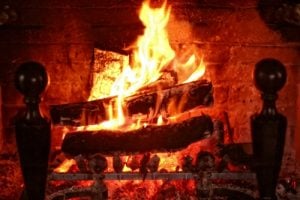 Reading By The Fireplace